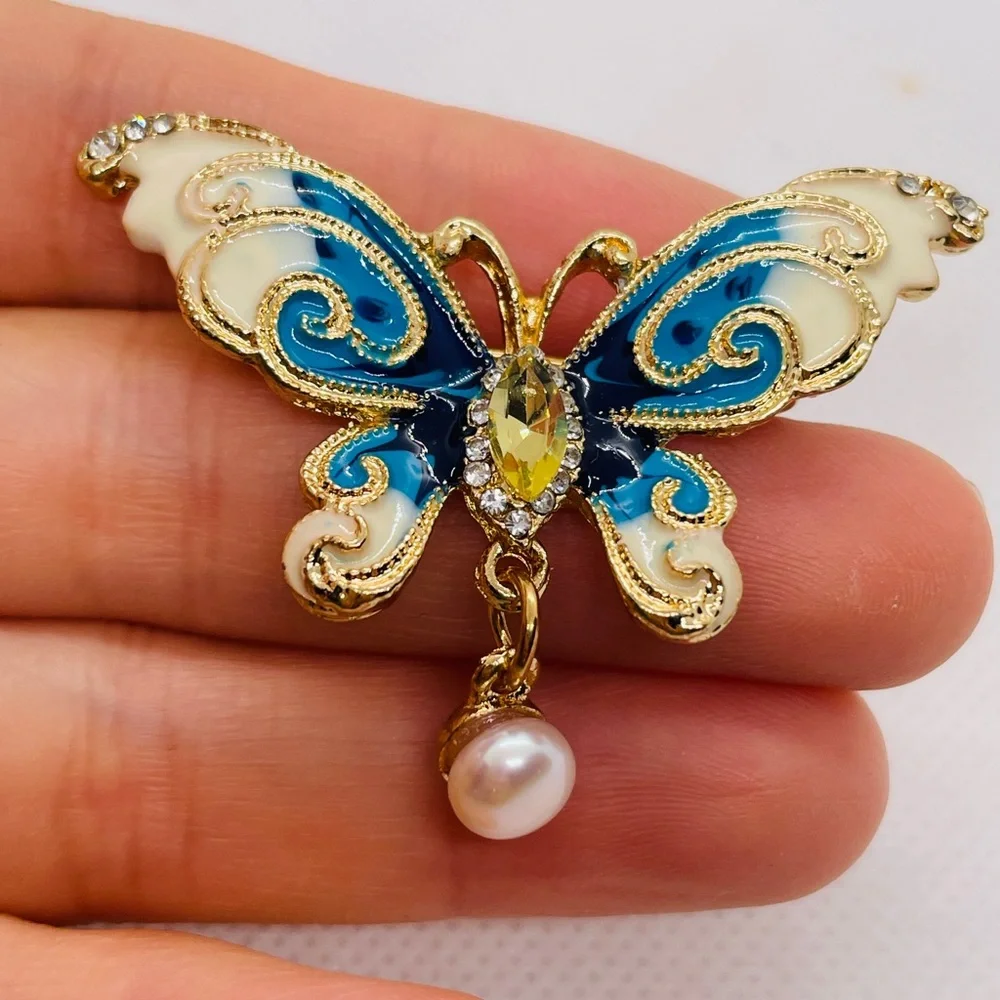 Elegant Gold and Blue Butterfly Brooch